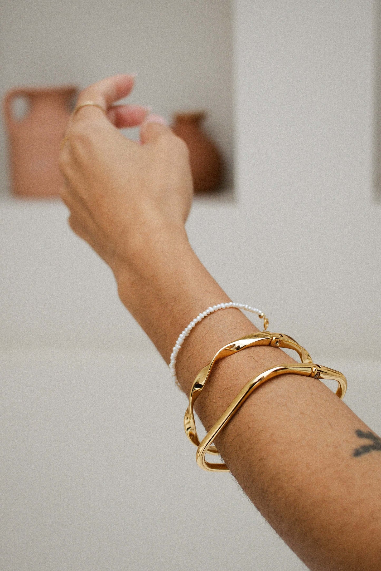 Hypoallergenic Velani Jewelry twisted bangle bracelet gold filled, tarnish resistant for everyday wear.