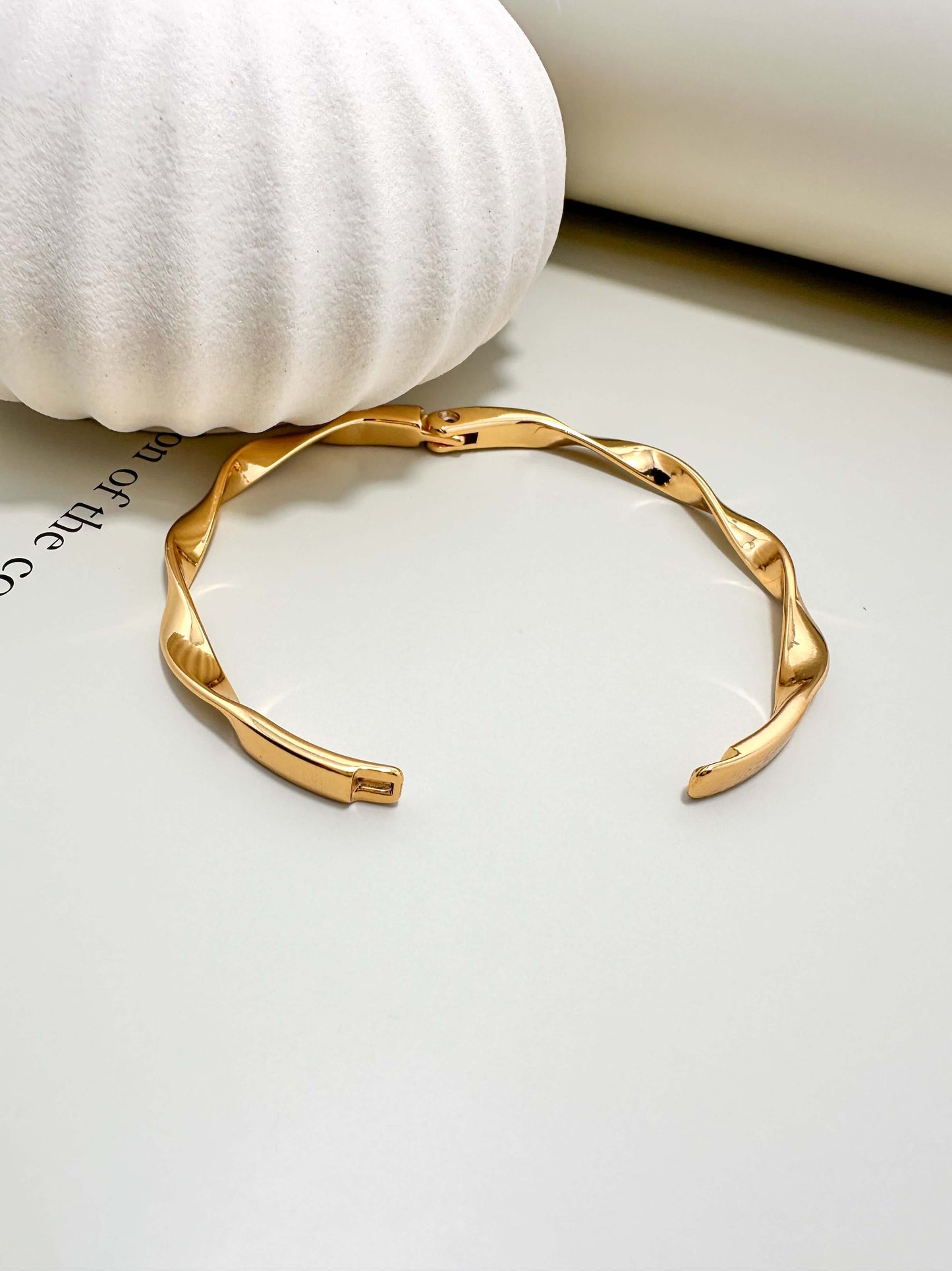 Velani Jewelry Twisted Bangle Bracelet, hypoallergenic, waterproof, gold filled, tarnish resistant, perfect for everyday wear.