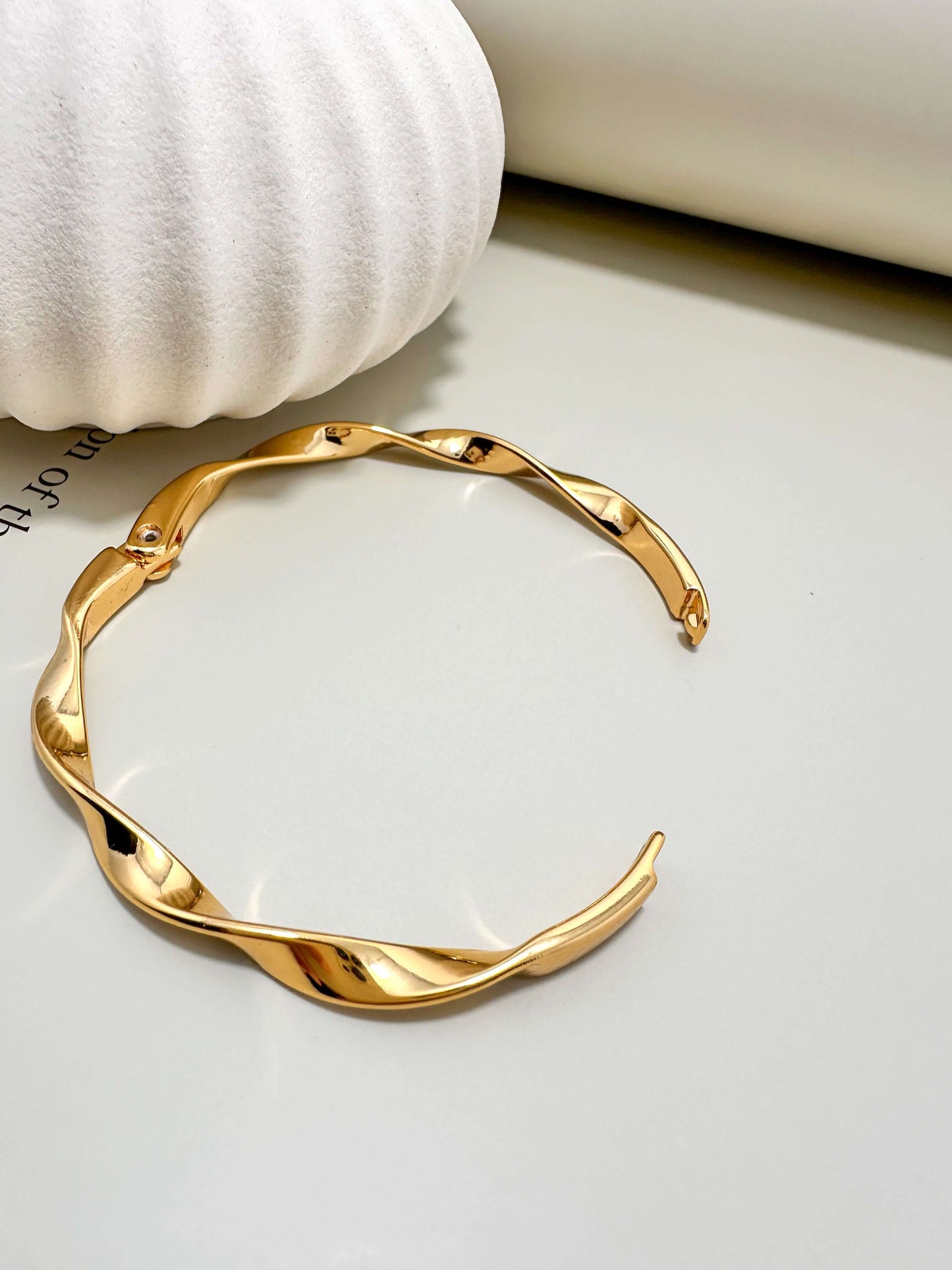 Velani Jewelry Twisted Bangle Bracelet, hypoallergenic, gold plated, tarnish resistant, perfect for everyday wear.
