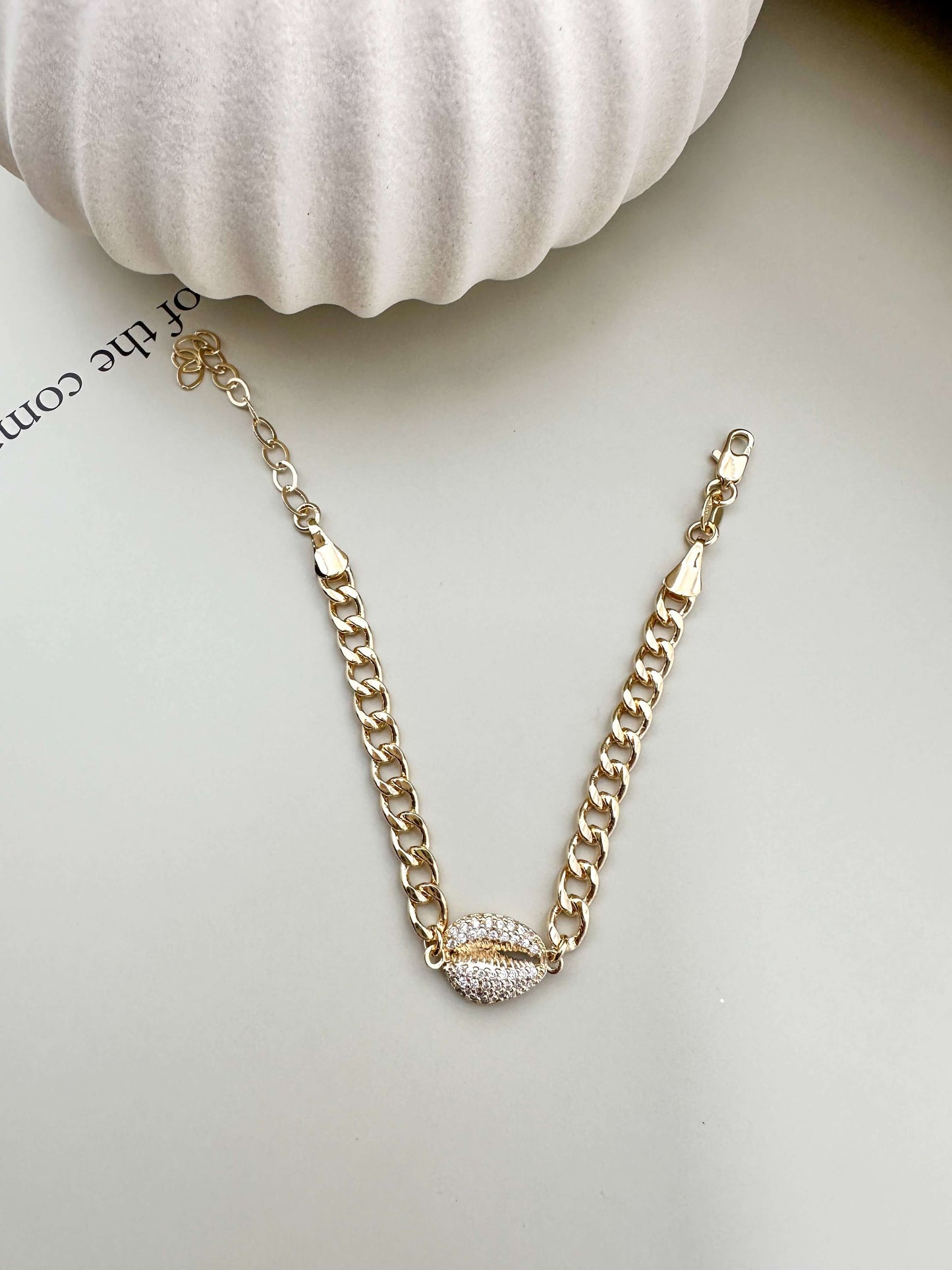 Velani Jewelry Cowrie Cuban Bracelet, gold filled, hypoallergenic, waterproof, with cubic zirconia, for everyday wear.