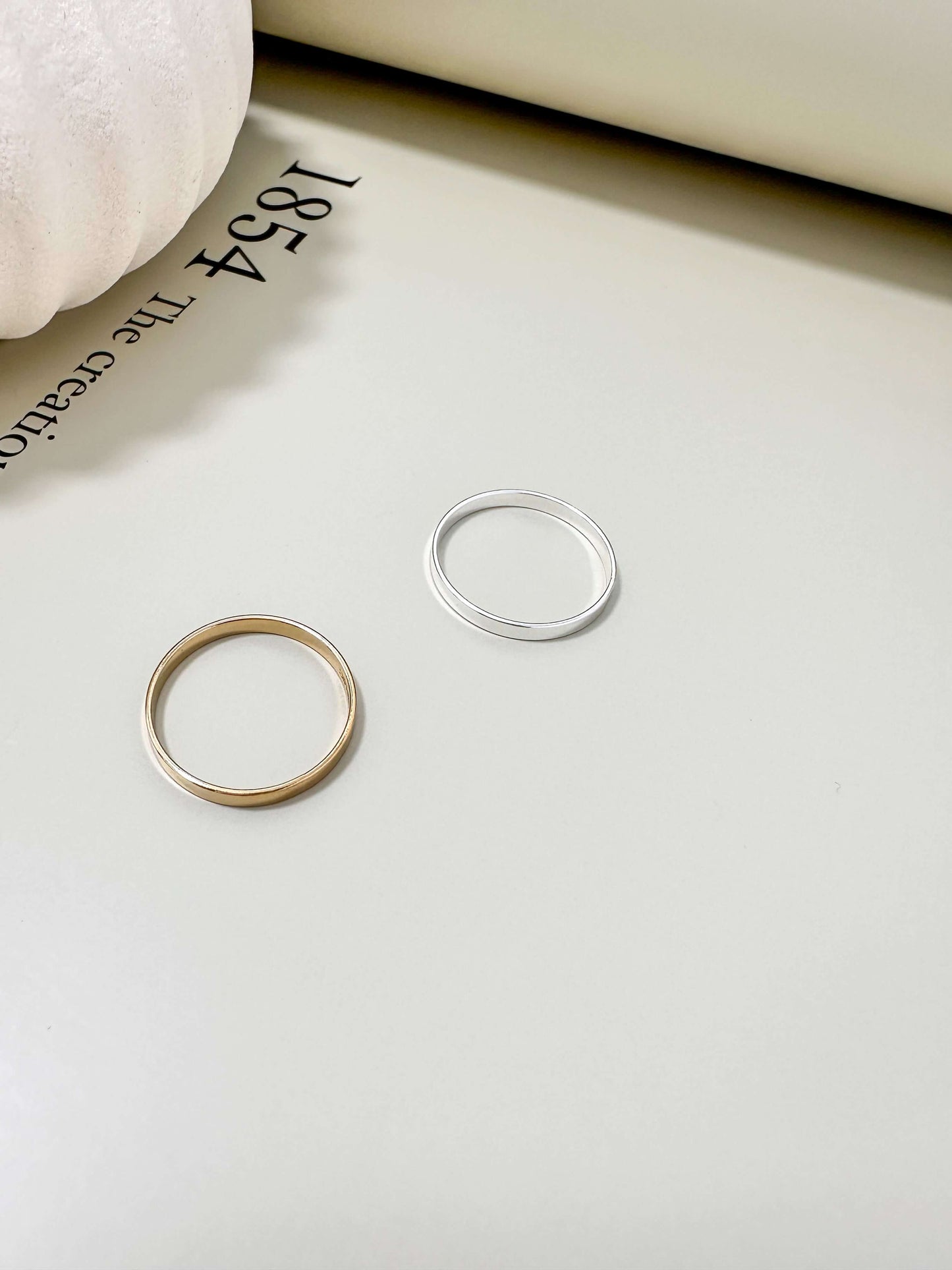 Velani Jewelry Flat Band Ring set in 14K gold filled and .925 silver, hypoallergenic and tarnish resistant for everyday wear.