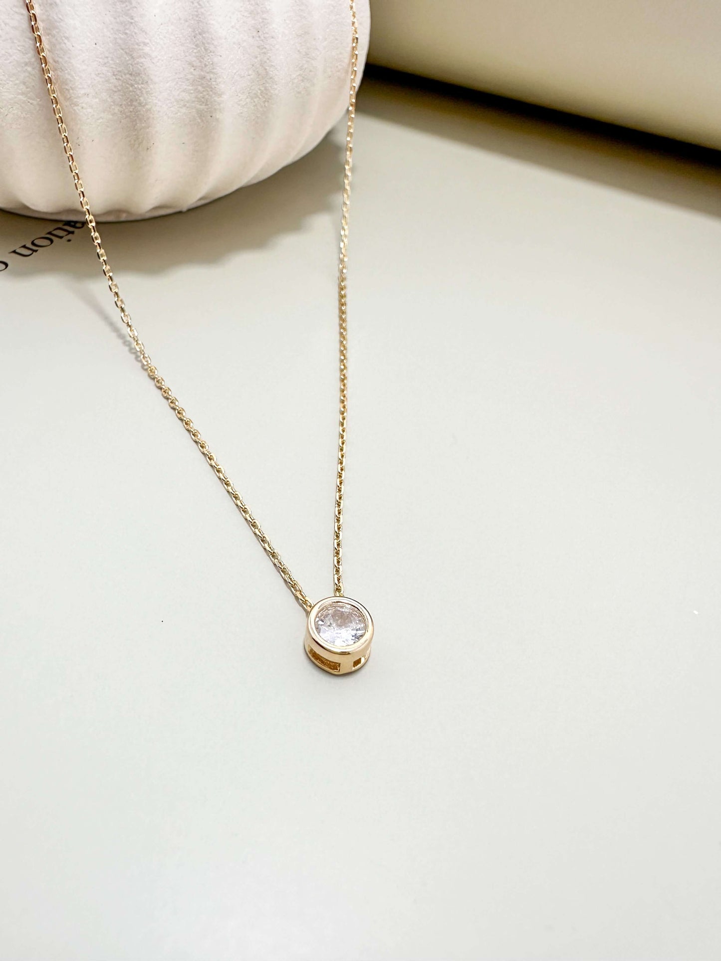 Velani Jewelry 18K gold filled hypoallergenic solitaire diamond necklace, waterproof and tarnish resistant for everyday wear.