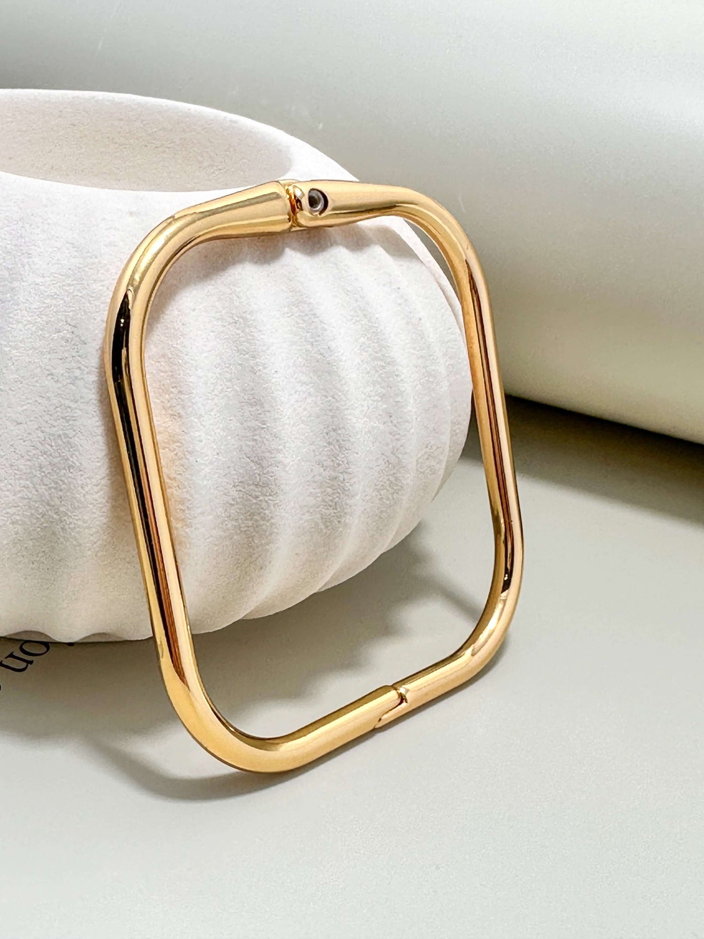 Velani Jewelry gold square bangle bracelet, hypoallergenic and tarnish resistant, perfect for everyday wear.