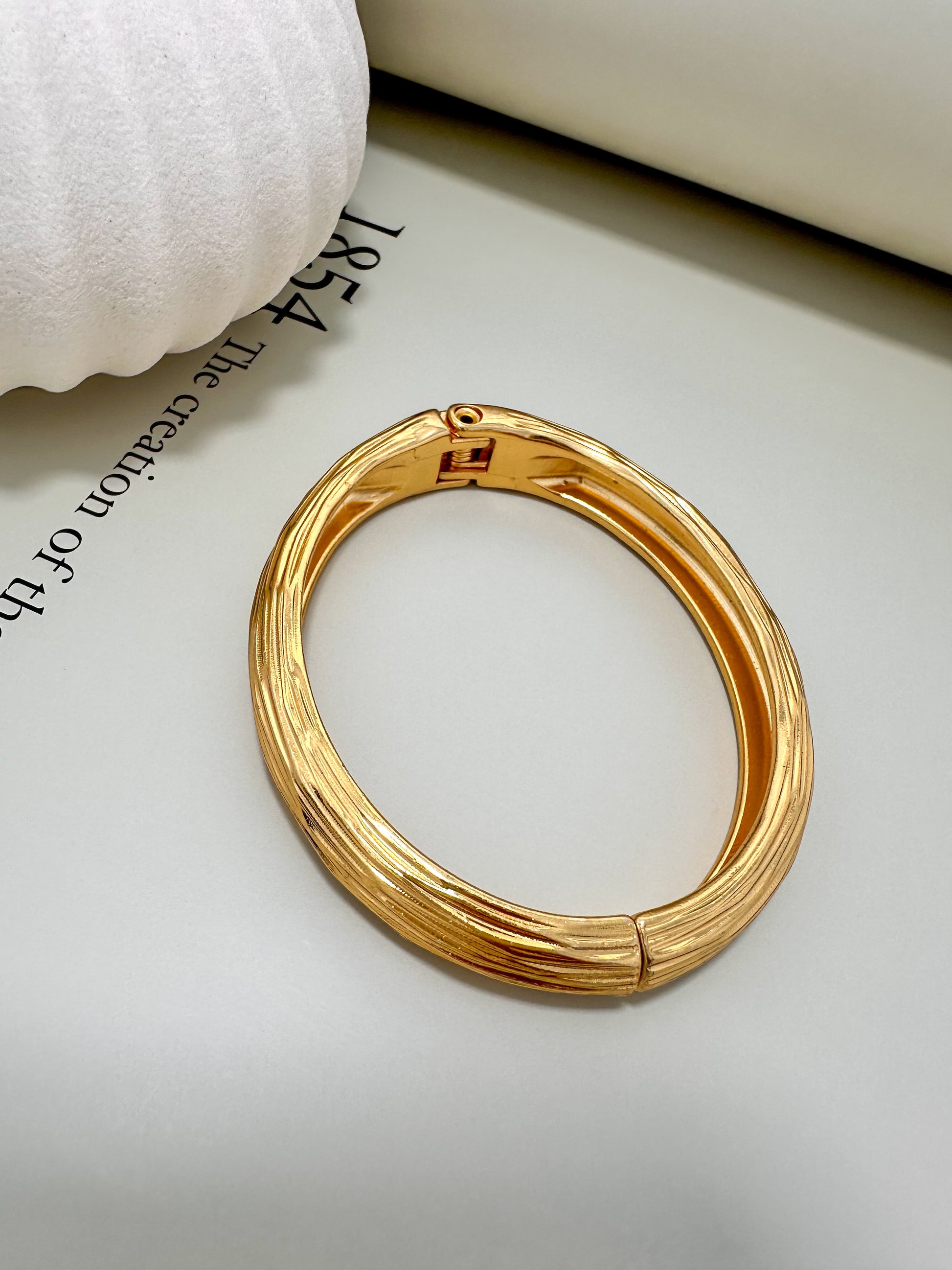 Velani Jewelry brushed bracelet, 18K gold plated, hypoallergenic, nickel-free, elegant design, made in Brazil, fits up to 7.5 inches.