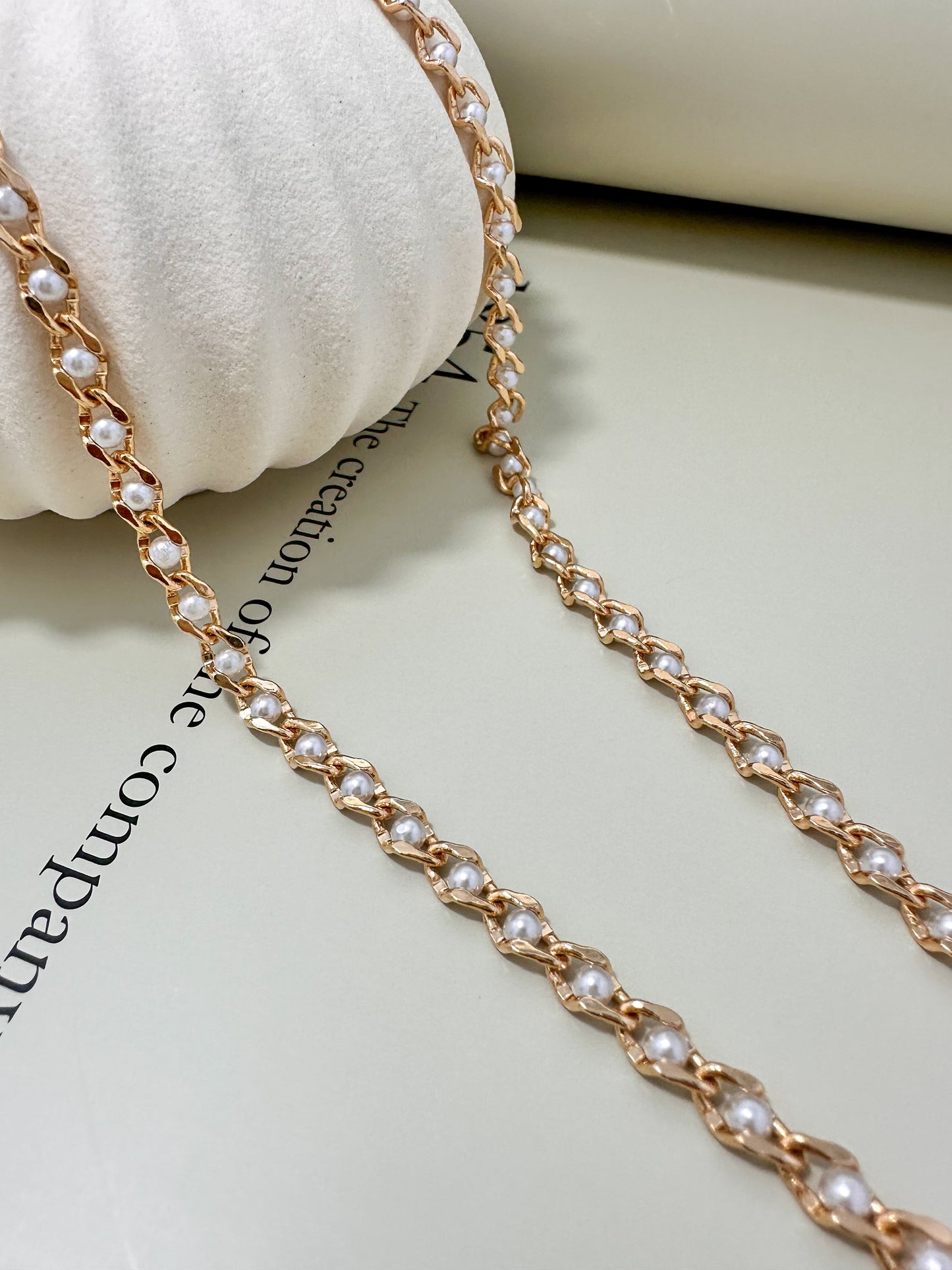 Velani Jewelry Pearl Eye Necklace featuring 18K gold filled chain and high-quality simulated pearls, showcasing elegance.