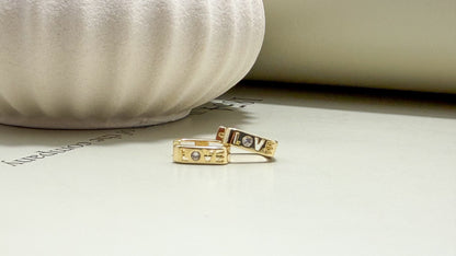 Love Letter CZ Huggie Earrings - Velani Jewelry