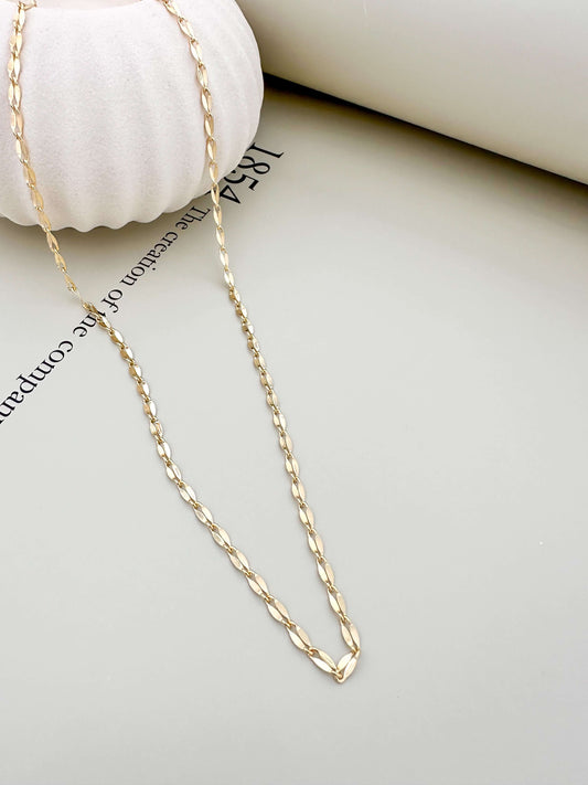 Velani Jewelry Corrente Luxe Necklace in 18K gold filled, tarnish resistant, and hypoallergenic for everyday wear.