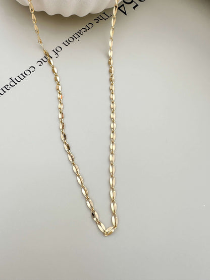 Velani Jewelry Corrente Luxe Necklace in 18K gold filled, hypoallergenic, waterproof, tarnish resistant, perfect for everyday wear.