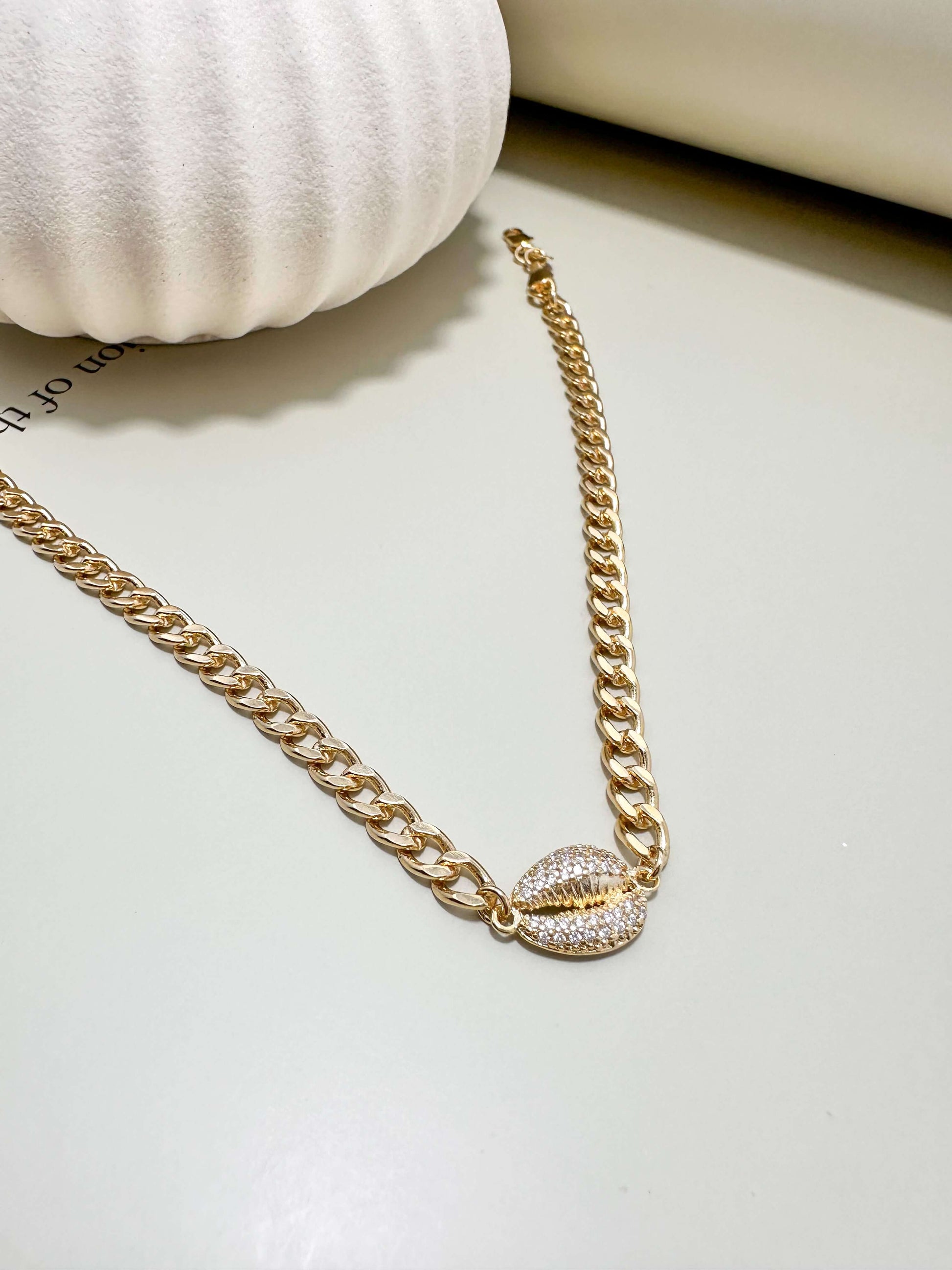 Velani Jewelry Cowrie Cuban Choker in 18K gold filled, featuring hypoallergenic and waterproof design, perfect for everyday wear.