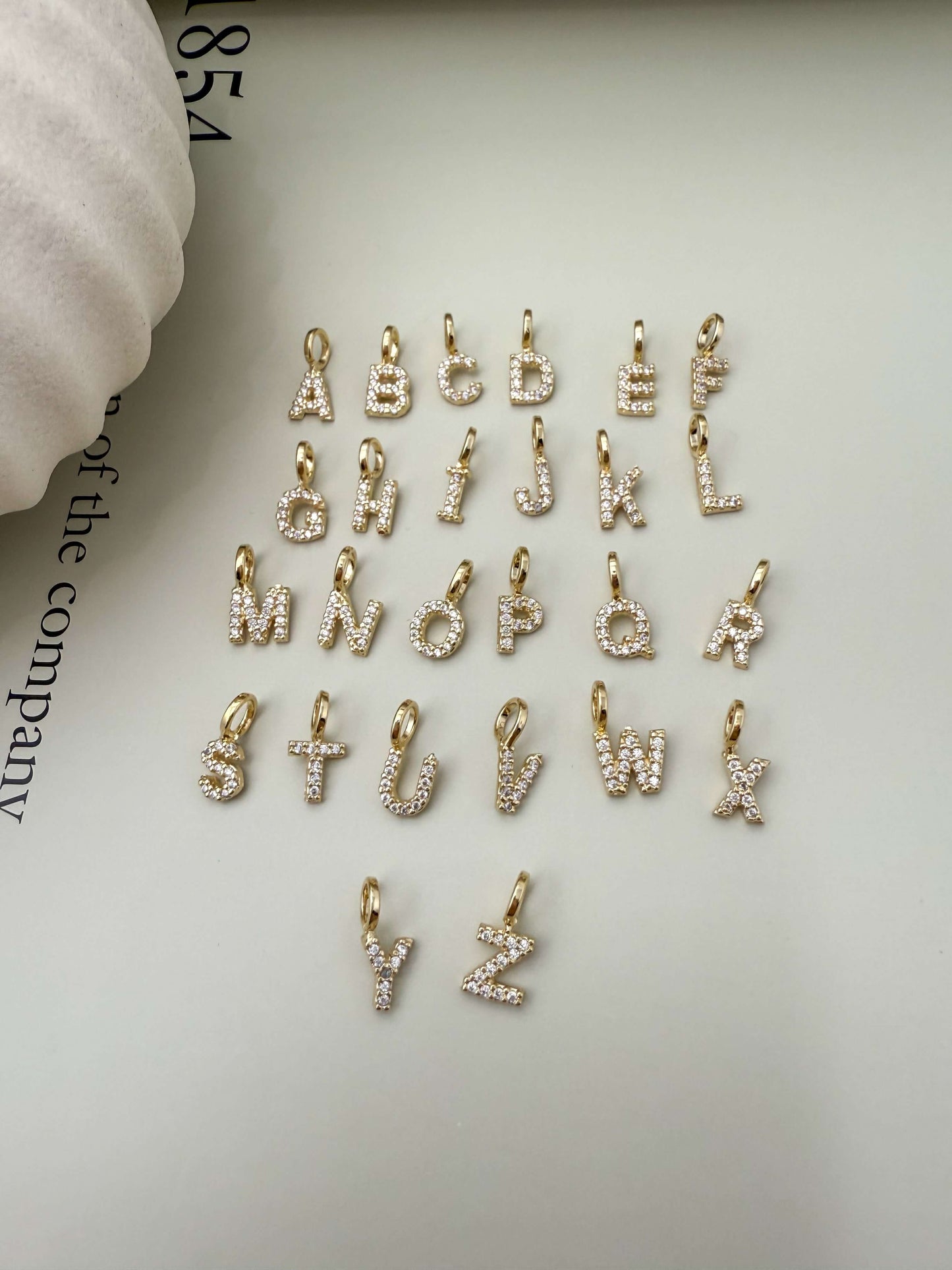 Velani Jewelry 18K Gold Filled Initial Letter Pendants with Cubic Zirconia, hypoallergenic and waterproof charm collection.