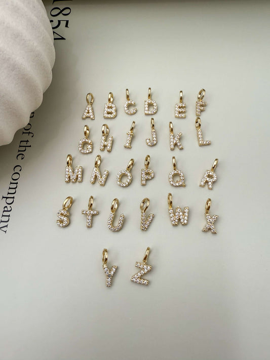Velani Jewelry 18K Gold Filled Initial Letter Pendants with Cubic Zirconia, hypoallergenic and waterproof charm collection.