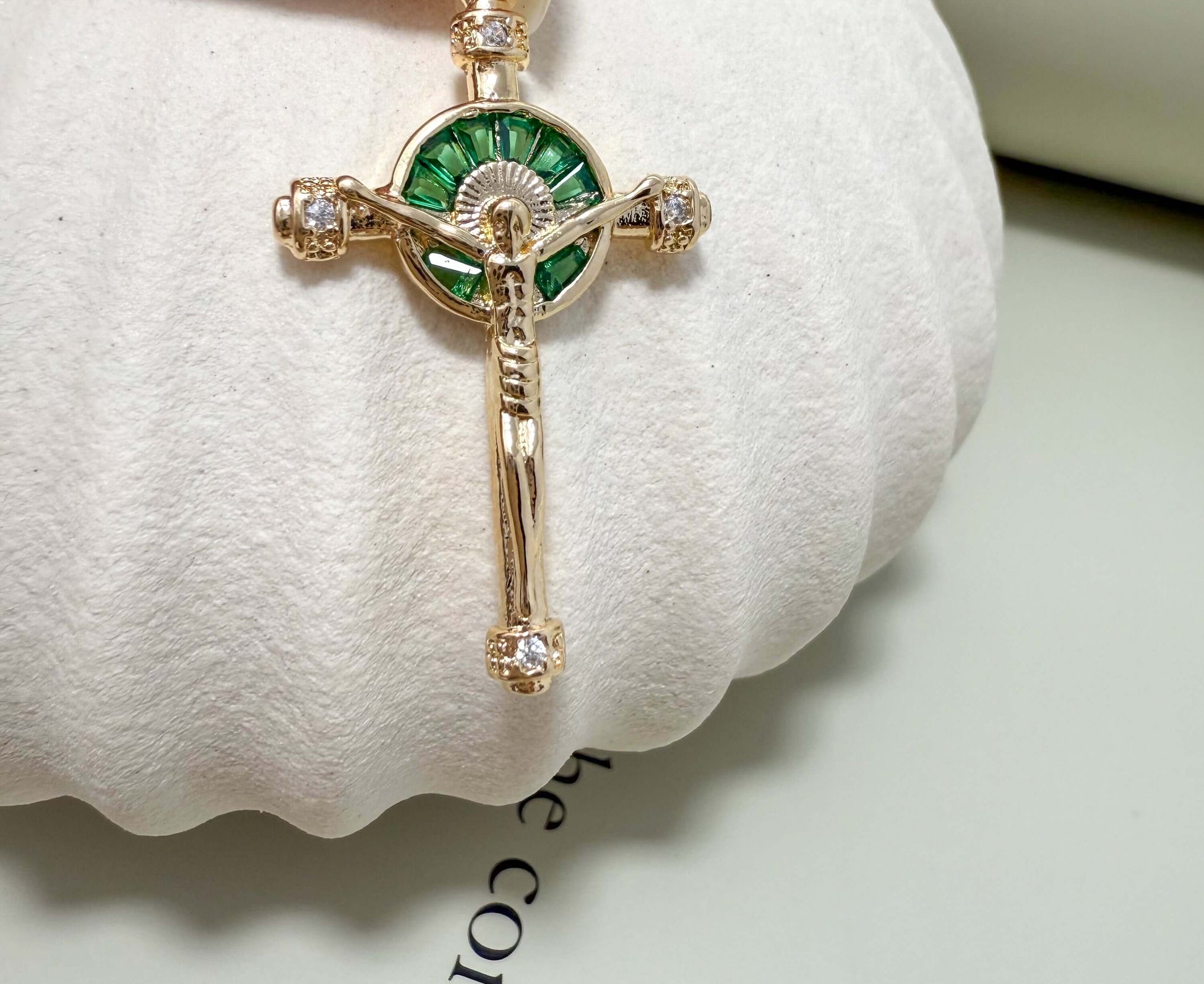 Velani Jewelry Elevated Cross Pendant with green accents, hypoallergenic, gold filled, tarnish resistant for everyday wear.