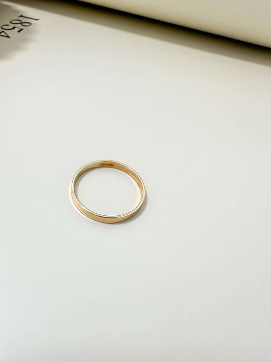 Velani Jewelry Flat Band Ring in 14K gold filled, hypoallergenic, tarnish resistant, and waterproof design.