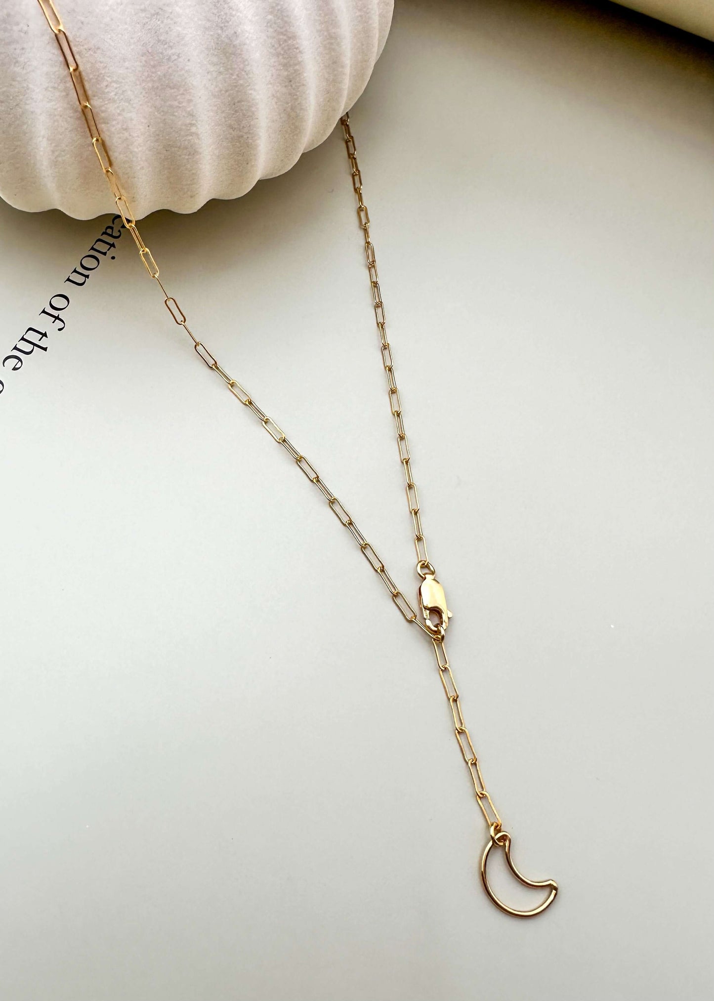 Velani Jewelry Lunar Paperclip Necklace in gold, featuring a moon pendant, lightweight and hypoallergenic, perfect for everyday wear.