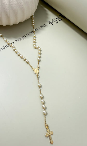 A Velani Pearl Rosary Necklace, representing accessible luxury and enduring quality of 18K gold-filled for Seattle.