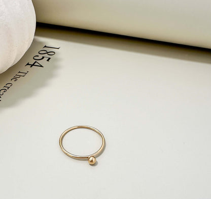 Velani Jewelry single ball stacking ring in 14K gold filled, hypoallergenic, tarnish resistant, perfect for everyday wear.