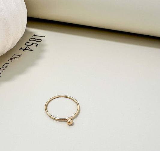 Velani Jewelry single ball stacking ring in 14K gold filled, hypoallergenic, tarnish resistant, perfect for everyday wear.