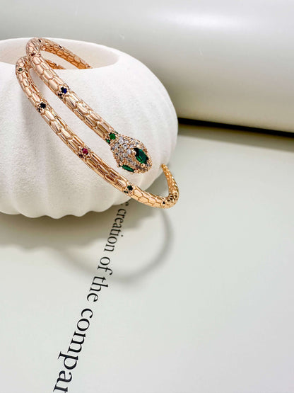 Velani Jewelry snake bracelet with sapphire, ruby, emerald. Hypoallergenic, waterproof, gold filled and tarnish resistant.