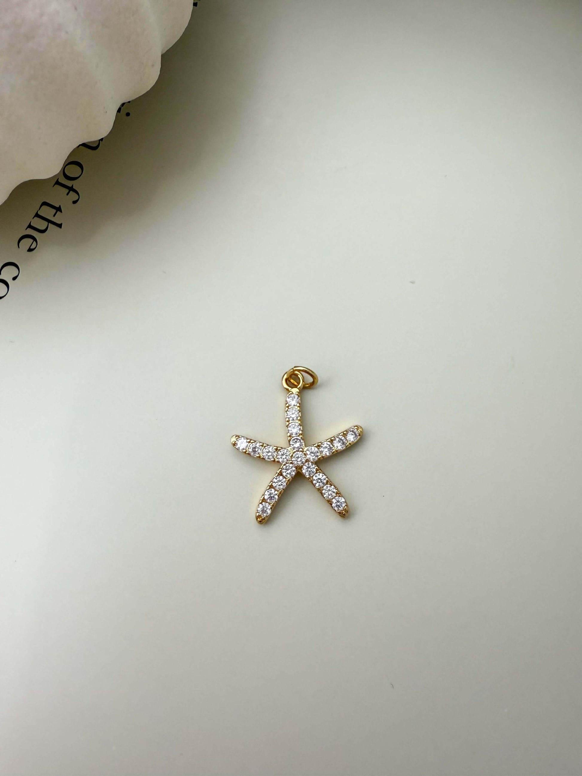 Velani Jewelry starfish pendant in 18K gold filled, hypoallergenic, with high-quality CZ, waterproof and tarnish resistant.