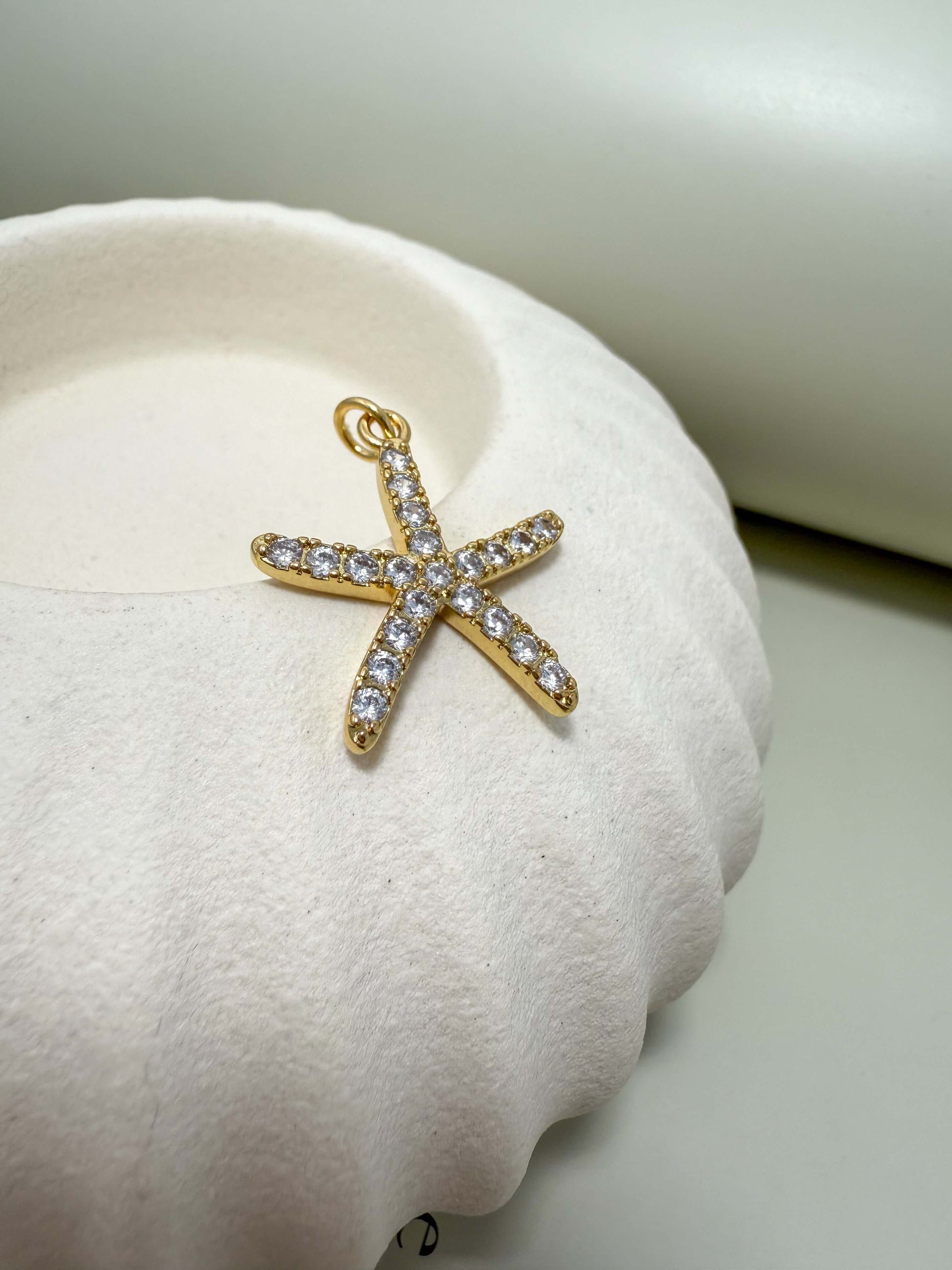 Gold filled starfish pendant with cubic zirconia, hypoallergenic, waterproof, tarnish resistant, perfect for everyday wear.