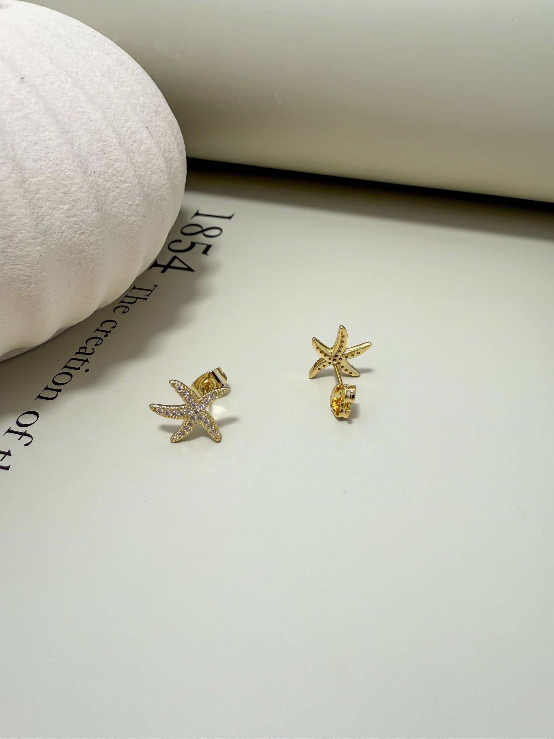 Velani Jewelry starfish stud earrings, 18K gold filled, hypoallergenic, water resistant, tarnish resistant, for everyday wear.